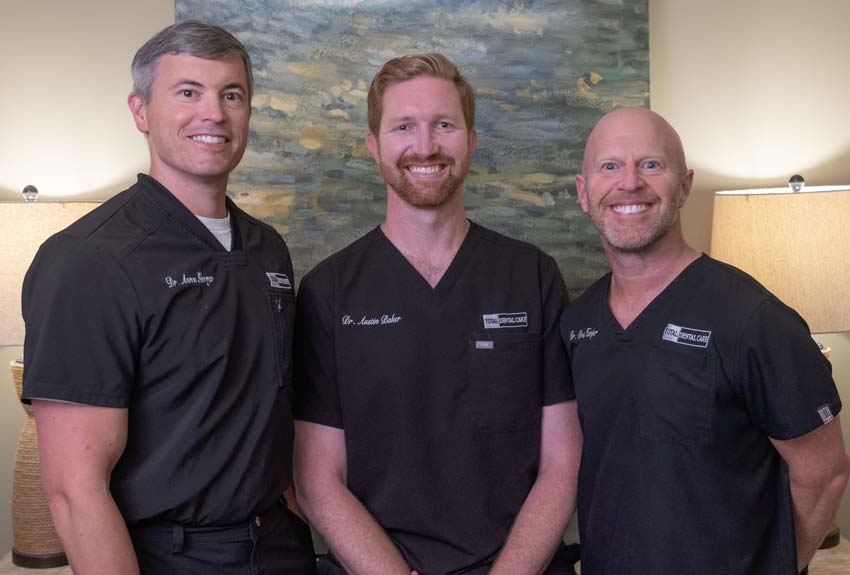 Portrait of Total Dental's three dentists. Dr. Harper, Dr. George and Dr. Baker