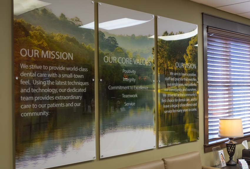 Total Dental Lobby - three panels describing their mission, core values and their vision