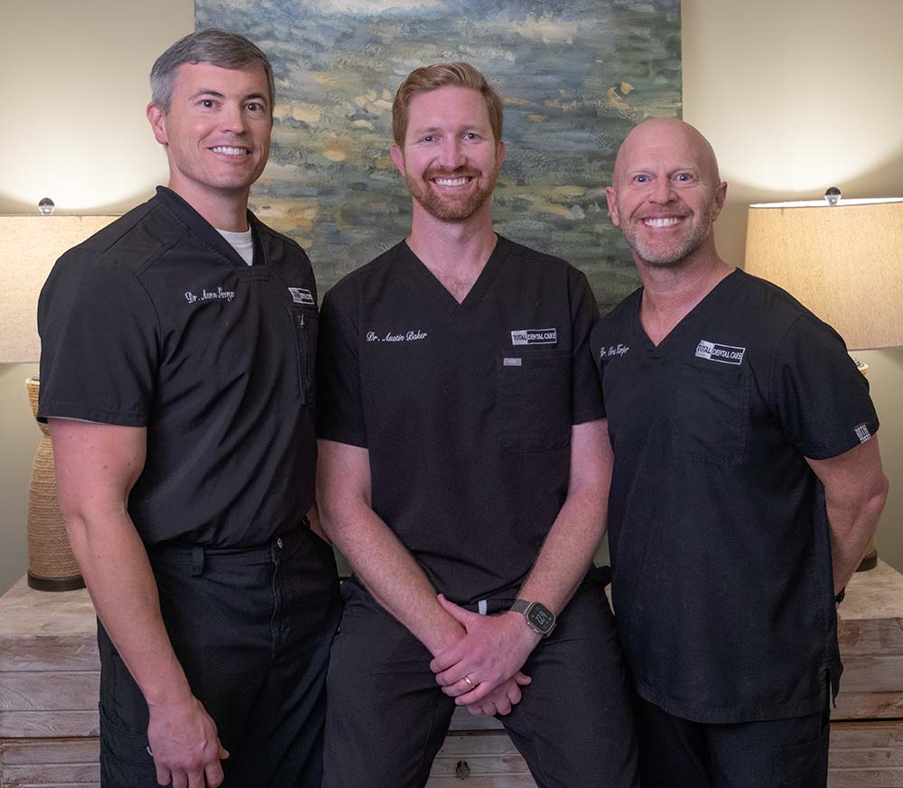 Portrait of our team of three dentists