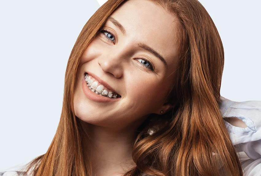 smiling teen-aged girl with braces