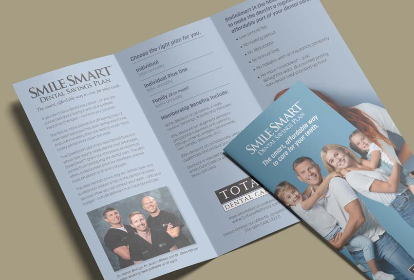 SmileSmart program brochure laid out on a table with the front cover and inside displayed