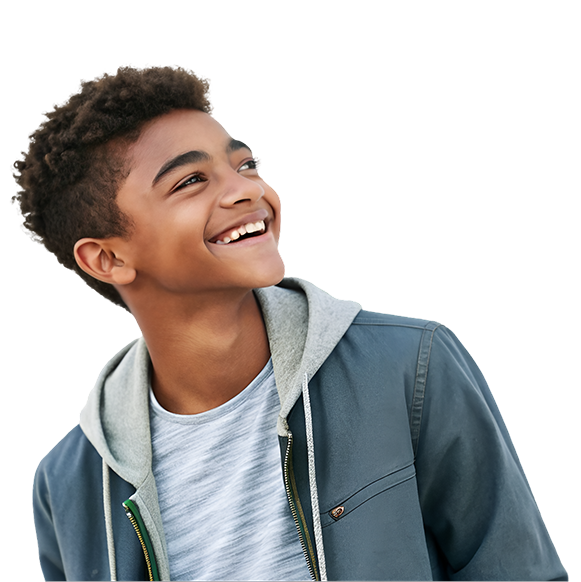 young pre-teen child smiling and looking up