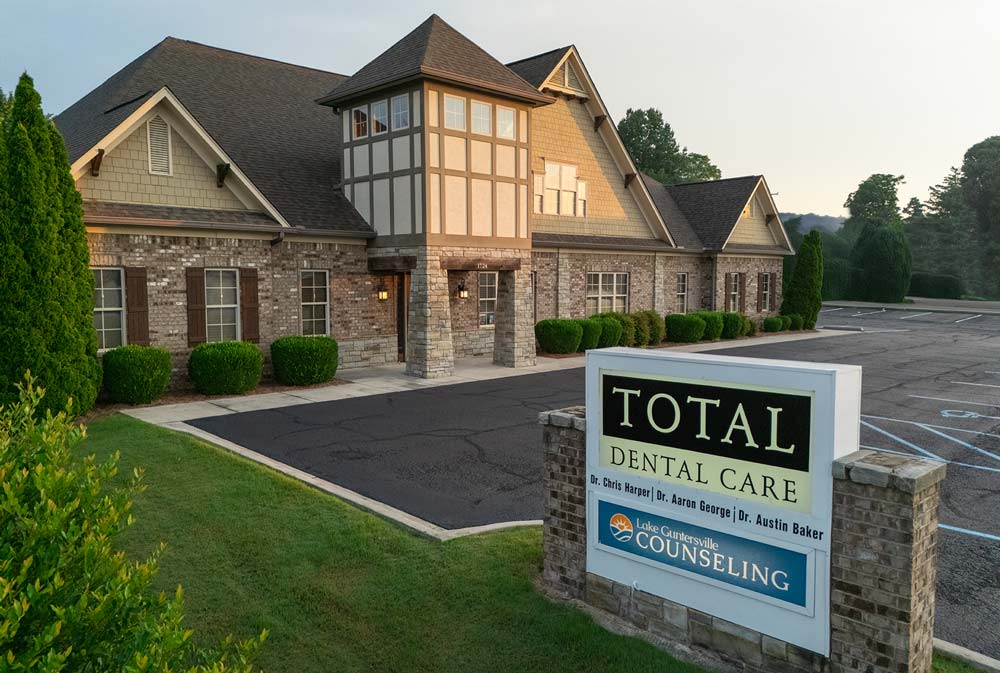 Total Dental Care exterior building with the sign in the foreground