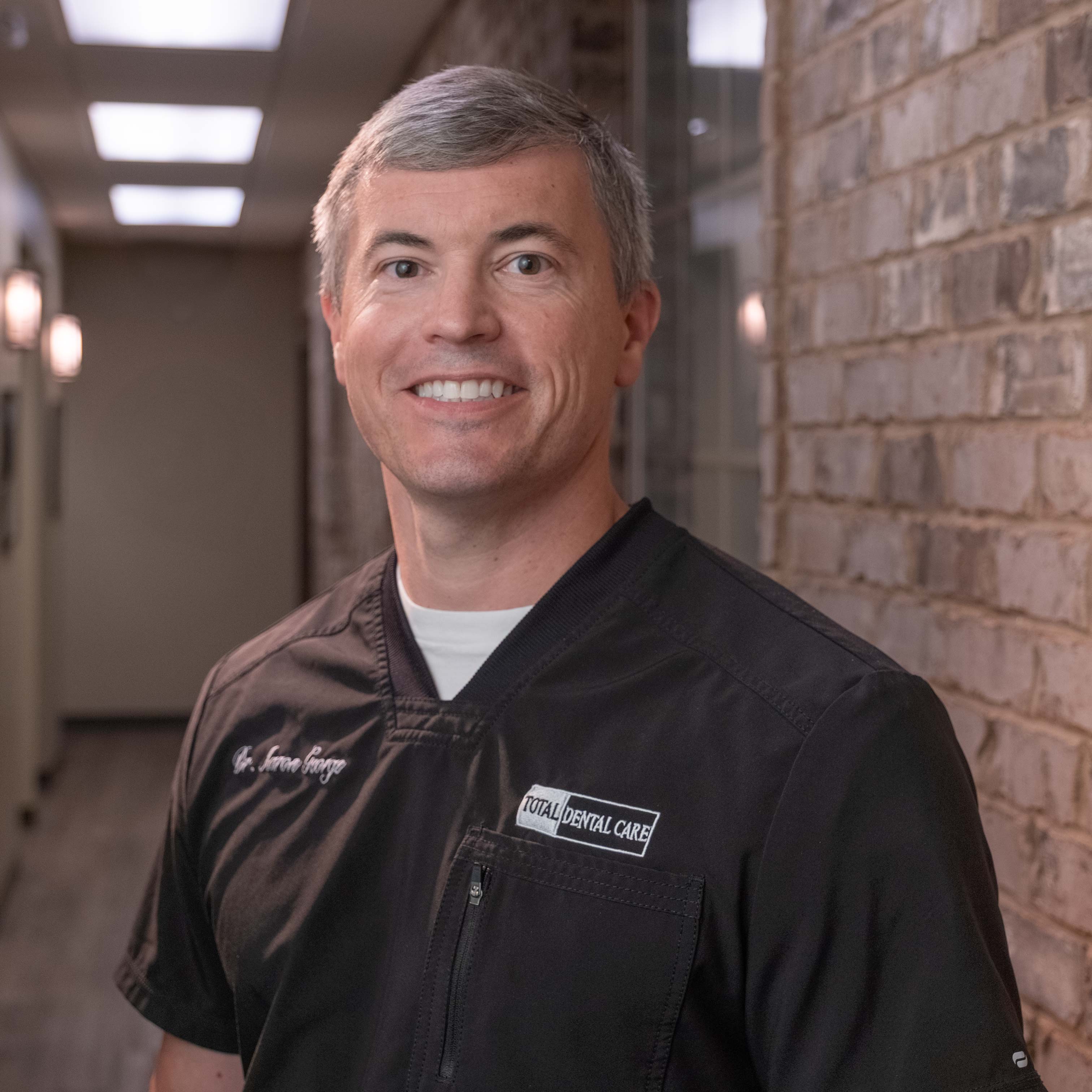 Dr. Aaron J. George